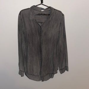 Grey long sleeve shirt, button on front and back